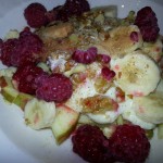 A typical Budwig muesli breakfast with Flax Farm linseed/flax oil, apple, banana, chopped nuts and raspberries.