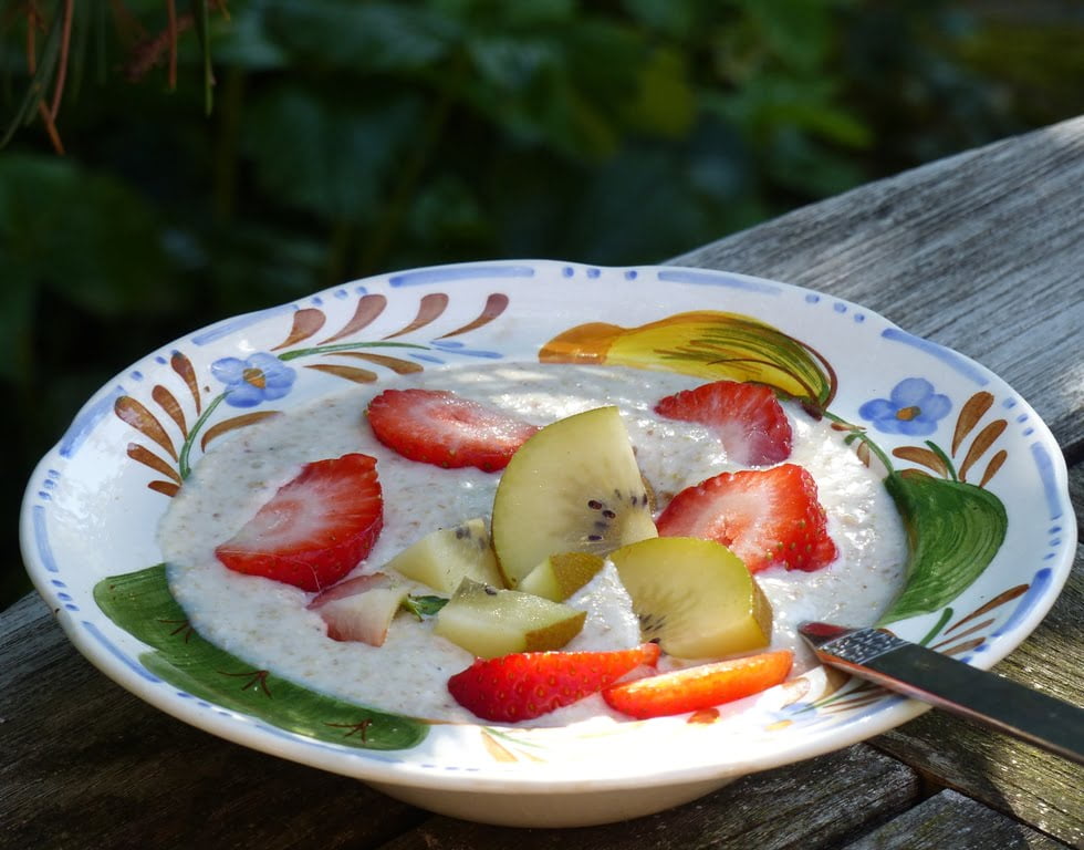 Naturally healthy buckwheat and linseed porridge with banana and fruit.