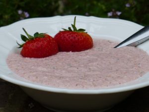 Raw sprouted oats, linseed and strawberry porridge.